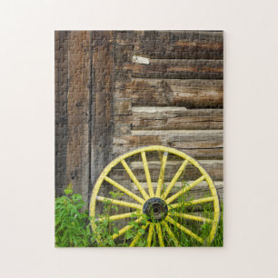 Old wagon wheel in historic old gold town jigsaw puzzle