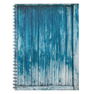 Old weathered grunge wooden faded pale blue paint notebook