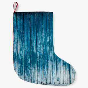 Old weathered grunge wooden faded pale blue paint  small christmas stocking