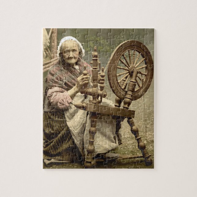 Old Woman With Spinning Wheel Jigsaw Puzzle (Vertical)