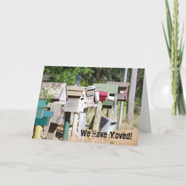 Old wooden aged letter boxes for  We have moved! Announcement (Front)