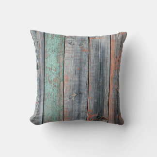 Old wooden fence painted in different colour, tren cushion