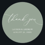 Olive Green Minimalist Wedding Thank You Classic Round Sticker<br><div class="desc">Our modern minimalist thank you sticker/seal has "thank you" written in modern calligraphy script and can be fully customised with your name,  dates and background colour. Made to match our Purple Plum Modern Minimalist Wedding Suite.</div>