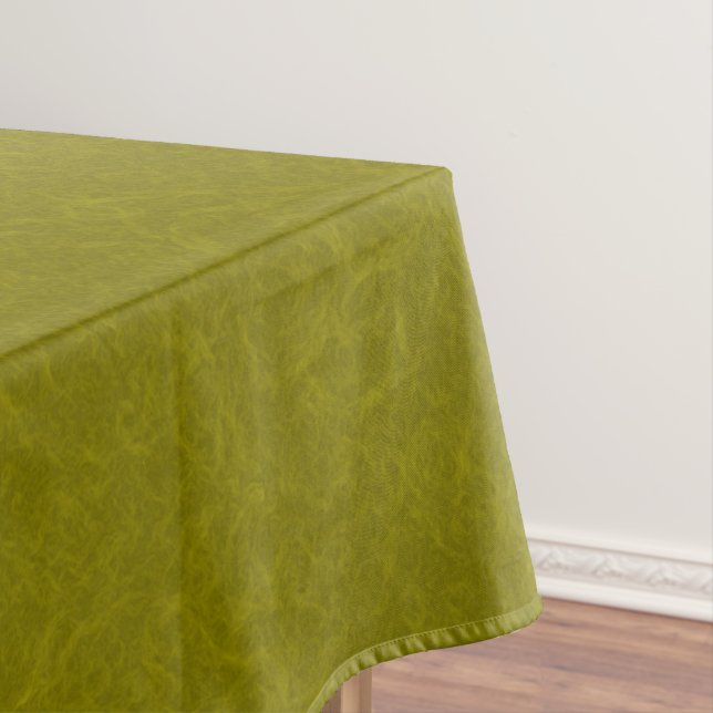 Olive green surface with subtle swirling pattern tablecloth (In Situ)