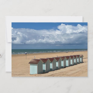 On the beach under the clouds