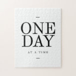 One Day Inspiring Sobriety Quote White Black Jigsaw Puzzle<br><div class="desc">"One Day At A Time". Inspirational motivational quote, in a stylish typographic design of black and white, perfect for decorating for your office, your gym or your home. Let this positive quote uplift your day. Makes the ideal gift for anyone working through something challenging difficult in their life step by...</div>