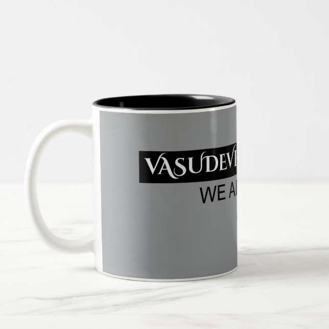 "One Earth. One Spirit. One Family." Two-Tone Coffee Mug (Left)