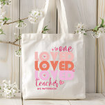 One Love Teacher Pink Modern Personalised Name Tote Bag<br><div class="desc">One Love Teacher Pink Modern Personalised Name features the text "one loved teacher" in modern pink script typography accented with love hearts and personalised with your custom name. Perfect for your favourite teacher for teacher appreciation,  birthday,  Christmas,  holidays and more. Designed by Evco Studio www.zazzle.com/store/evcostudio</div>