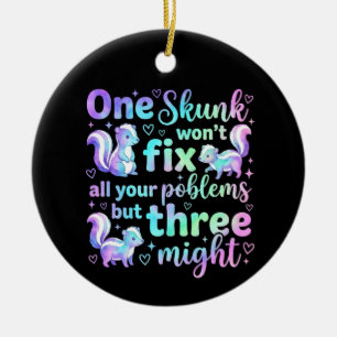 One skunk won't fix all your problems but three ceramic tree decoration