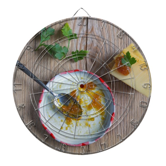Onion pineapple chutney on rustic wood dartboard (Front)