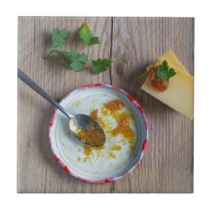 Onion pineapple chutney on rustic wood tile