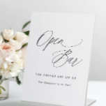 Open Bar Wedding Sign Elegant Modern Calligraphy<br><div class="desc">Open Bar Wedding Sign: This modern wedding sign features elegant and romantic calligraphy. It says "Open Bar" in an elegant romantic calligraphy. Below is the text "The drinks are on us. The hangover is on you". See more products in this romantic calligraphy wedding collection below.</div>