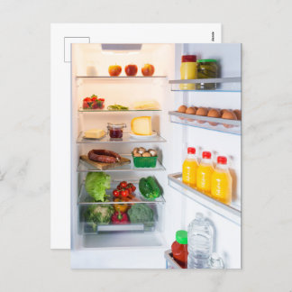 Open fridge filled with food holiday postcard