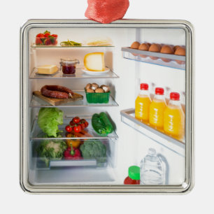 Open fridge filled with food metal tree decoration