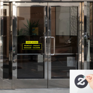 Open hours sign on the glass door