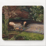 Ophelia by John Everett Millais Mouse Mat<br><div class="desc">Ophelia by John Everett Millais,  the founder of the Pre Raphaelite movement,  painted in 1852. Inspired by the character of the same name in the play Hamlet by William Shakespeare. A young woman posed floating in a bathing tub for this.</div>