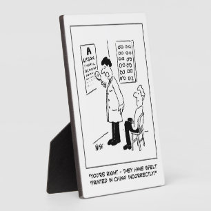 Optician giving an eye-test. Funny Plaque