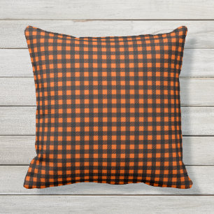 Orange and black buffalo plaid cushion