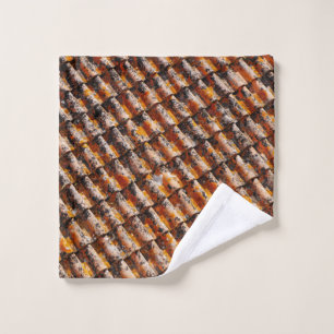 Orange-and-black roof shingles wash cloth