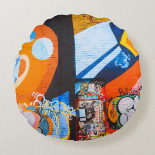 Orange and blue graffiti round cushion