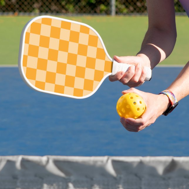 Orange and Light Orange Chequerboard Pickleball Paddle (Insitu)