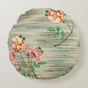 Orange and pink vintage flowers with green leaves round cushion