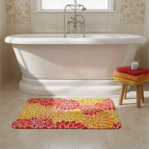 orange and red dahlias bath mat