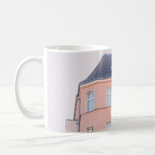 ORANGE AND WHITE CONCRETE BUILDING COFFEE MUG