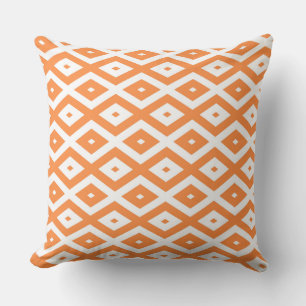 Orange and white diamond pattern cushion