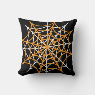 Orange and white spider web cushion