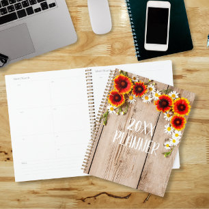 Orange and Yellow Chamomile Flowers On Rustic Wood Planner