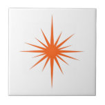 Orange Atomic Starburst Mid-century Modern Tile<br><div class="desc">This mid century modern ceramic tile features a bold orange atomic starburst,  which will make a fantastic addition to your tiling project.</div>