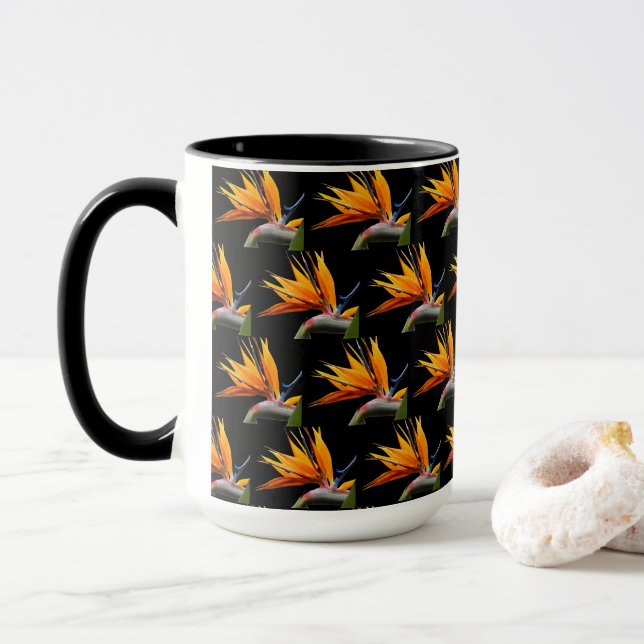 Orange Bird of Paradise Plant Pattern on Black Mug (With Donut)