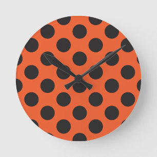 Orange + Black polka dot pattern modern bug Round Clock