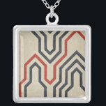 Orange & Blue Graphic Lines Silver Plated Necklace<br><div class="desc">Graphic orange and blue lines traverse this piece by Chariklia Zarris. The orange line cuts through most of the work,  while the blues lines have a discernable pattern to them. Get yours now!</div>