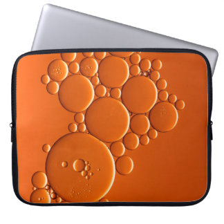 Orange bubbles art laptop sleeve