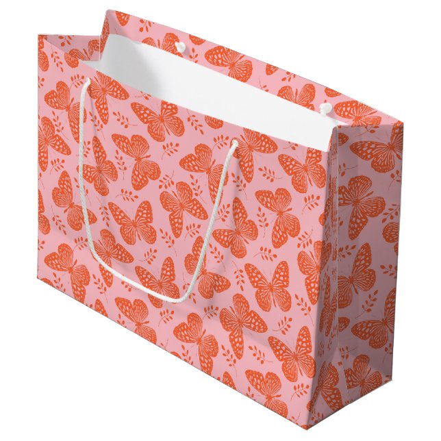 Orange butterfly pattern on pink background large gift bag (Front Angled)