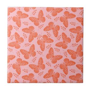 Orange butterfly pattern on pink background tile