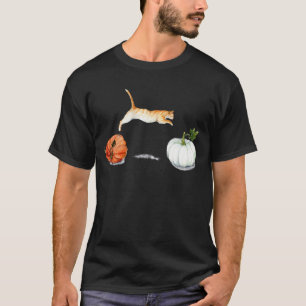 Orange Cat Jumping Between Pumpkins T-Shirt