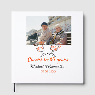 Orange cheers to 60 years anniversary wedding guest book