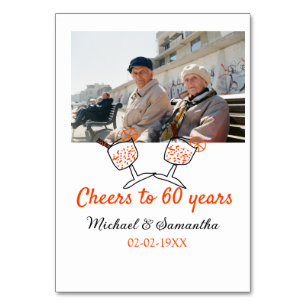 Orange cheers to 60 years anniversary wedding  table number