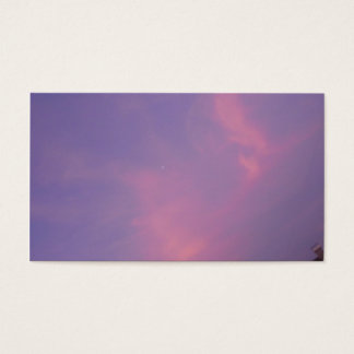 Orange clouds on the blue sky at sunrise