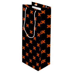 Orange cross stitches on black wine gift bag