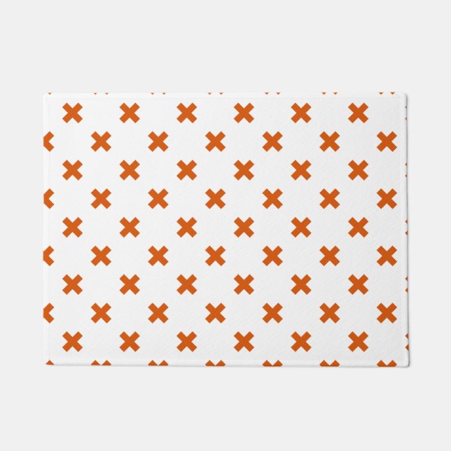 Orange cross stitches on white doormat (Front)