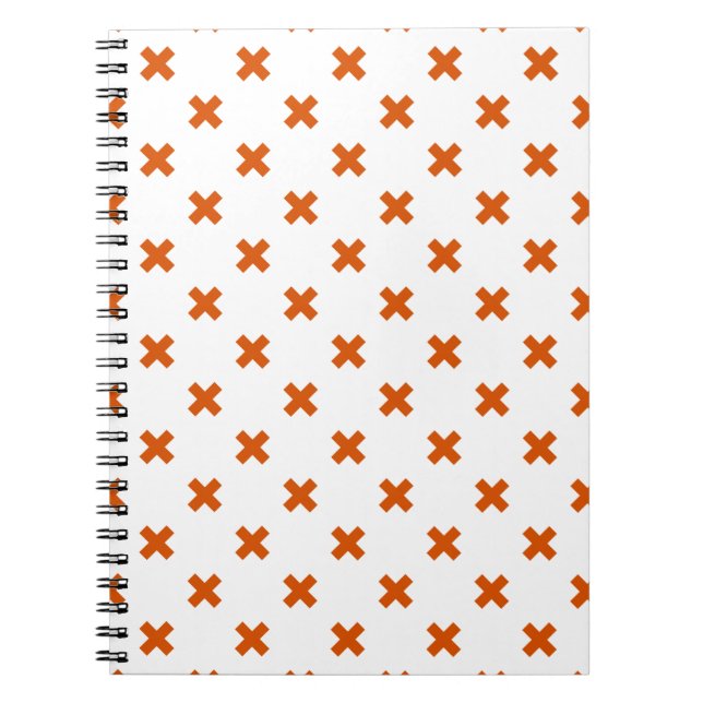 Orange cross stitches on white notebook (Front)