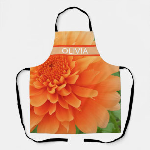 Orange dahlia flower close-up Floral Apron