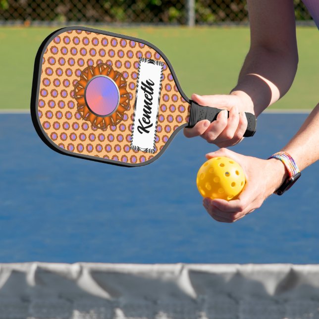 Orange Disc Ribbon by Kenneth Yoncich Pickleball Paddle (Insitu)