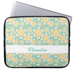 Orange flowers on green laptop sleeve