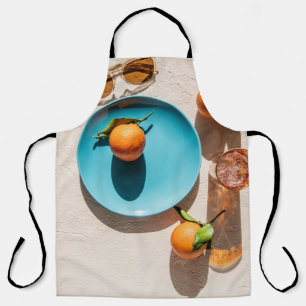 Orange fruit on plate apron