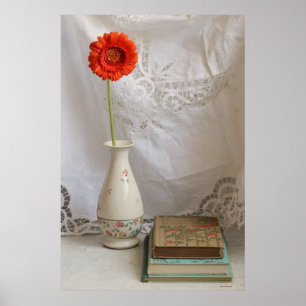 Orange gerbera and old books poster